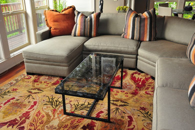Medium sized eclectic enclosed living room in Los Angeles with medium hardwood flooring.