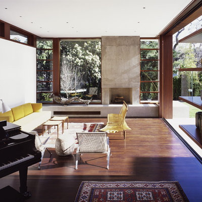 Inspiration for a modern living room remodel in San Francisco with a music area and a standard fireplace
