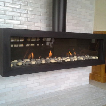 Wall Hanging Linear Gas Fireplace by Ortal