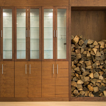 Walnut and silver leaf cabinets and logstore