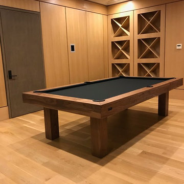 Walnut pool table with a ping pong and dining coversion top
