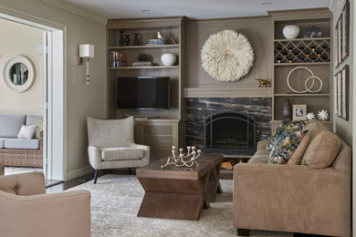Inspiration for a large transitional formal and enclosed brown floor living room remodel in Toronto with a standard fireplace, a stone fireplace, beige walls and a wall-mounted tv