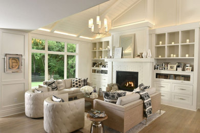 Living room - transitional open concept light wood floor and beige floor living room idea in Other with white walls, a standard fireplace, a brick fireplace and no tv