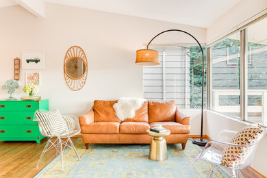 Mid-century modern living room photo in Seattle