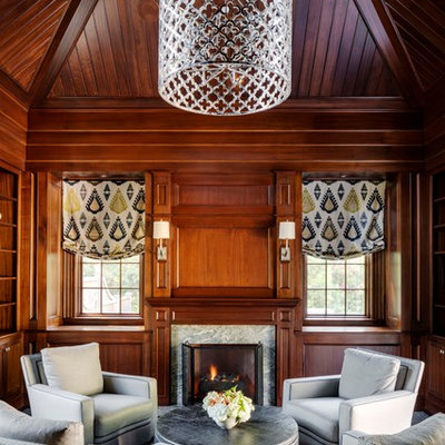 Living room - traditional formal and enclosed carpeted living room idea in Boston with brown walls, a standard fireplace and a stone fireplace