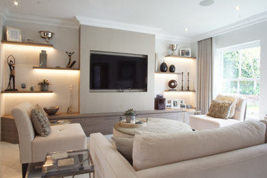 Inspiration for a contemporary living room in London with beige walls.