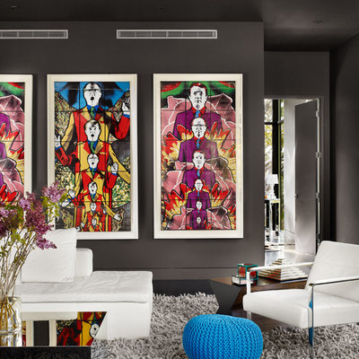 Inspiration for a contemporary living room remodel in Austin with black walls