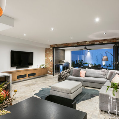 Inspiration for a contemporary open concept gray floor living room remodel in Perth with white walls and a wall-mounted tv