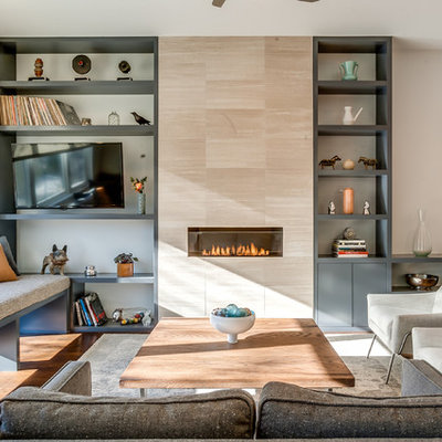 Inspiration for a mid-sized contemporary formal and open concept dark wood floor living room remodel in Chicago with a tile fireplace, a ribbon fireplace, beige walls and a wall-mounted tv