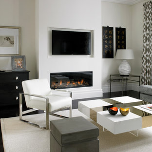 Design ideas for a medium sized contemporary open plan living room in London with beige walls, dark hardwood flooring, a ribbon fireplace and a wall mounted tv.
