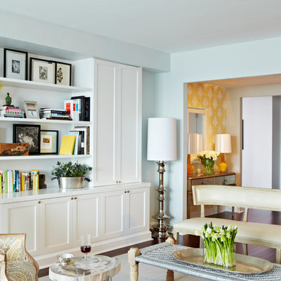 Transitional living room photo in New York with blue walls
