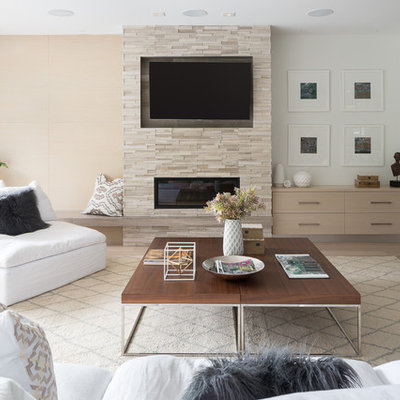 Inspiration for a large contemporary open concept and formal light wood floor and beige floor living room remodel in Vancouver with a stone fireplace, a wall-mounted tv, white walls and a ribbon fireplace