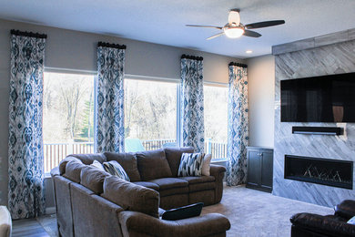 Example of a large transitional open concept living room design in Other with white walls