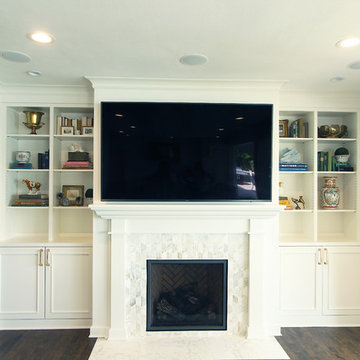 White Fireplace Built-Ins with Geometric Marble Tile