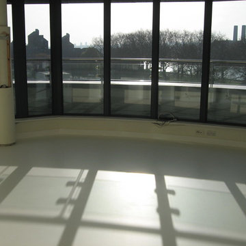 White Seamless Poured Resin Comfort Floor installed at London Apartment