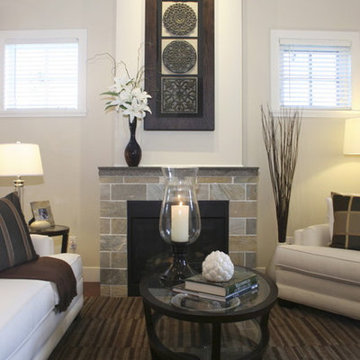 Inspiration for a contemporary living room remodel in Vancouver with a standard fireplace