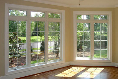 Medium sized classic enclosed living room in Philadelphia with beige walls and medium hardwood flooring.