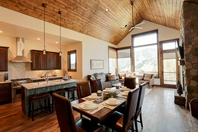 This is an example of a large rustic living room in Denver.