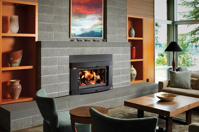 Living room - mid-sized contemporary formal and open concept living room idea in Seattle with a standard fireplace, a concrete fireplace and no tv