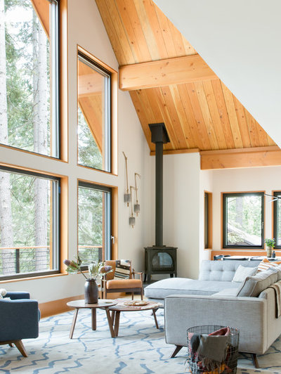 Rustic Living Room by Regan Baker Design Inc.