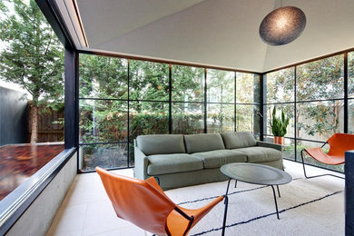 Medium sized contemporary open plan living room in Sydney.