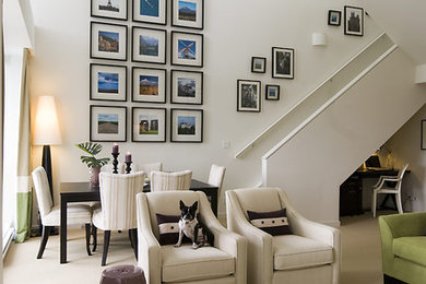 Contemporary open plan living room in Vancouver with white walls.