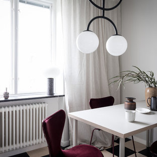 Idéer för att renovera en skandinavisk matplats, med vita väggar och flerfärgat golv