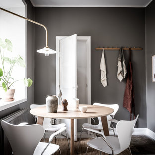 Inredning av en nordisk matplats, med grå väggar och grått golv