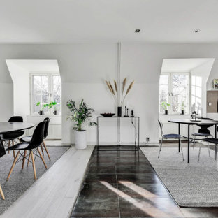 Idéer för en skandinavisk matplats, med vita väggar och grått golv