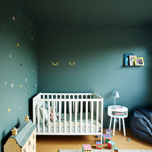 Inspiration for a scandi nursery for girls in London with blue walls.