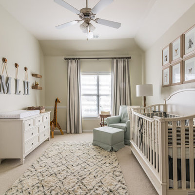 Inspiration for a transitional gender-neutral carpeted and beige floor nursery remodel in Atlanta with beige walls