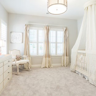 Nursery - traditional carpeted and gray floor nursery idea in Charlotte with gray walls