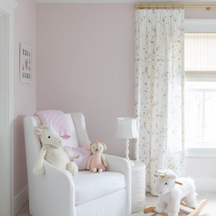 Large cottage girl carpeted and white floor nursery photo in Chicago with pink walls