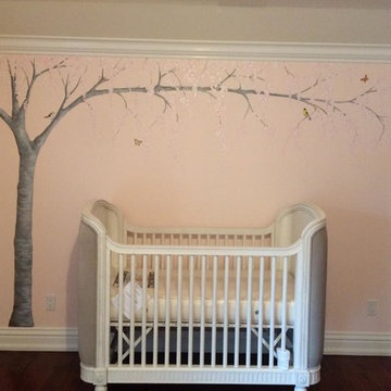 Brookville, NY:  Hand painted Cherry tree on walls in nursery
