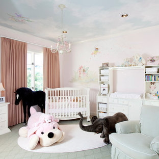 Inspiration for a large timeless girl carpeted and gray floor nursery remodel in Houston with pink walls