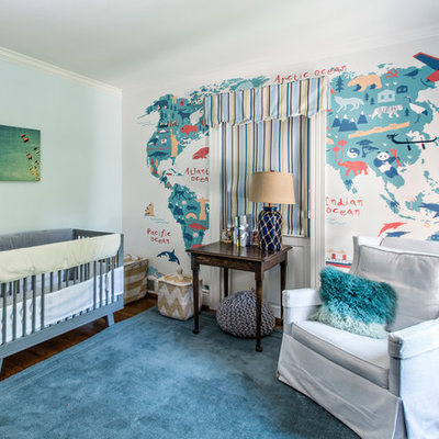 Example of a transitional gender-neutral medium tone wood floor and brown floor nursery design in Louisville with white walls