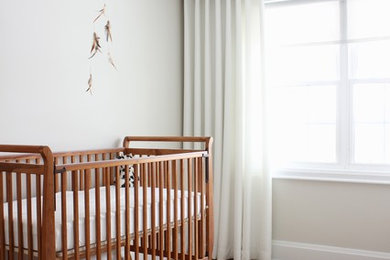 Example of a transitional nursery design in Toronto