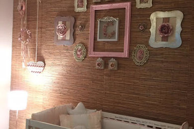 This is an example of a medium sized vintage nursery for girls in Miami.