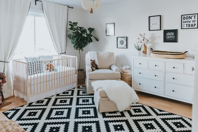 Example of a transitional nursery design in Other