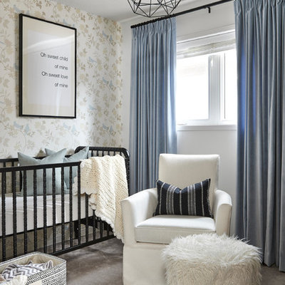 Nursery - small traditional boy carpeted and gray floor nursery idea in Toronto with multicolored walls