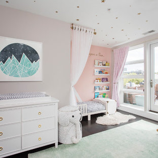 Nursery - mid-sized transitional dark wood floor and brown floor nursery idea in New York with gray walls