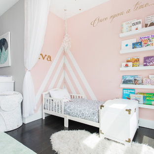 Inspiration for a mid-sized transitional dark wood floor and brown floor nursery remodel in New York with gray walls