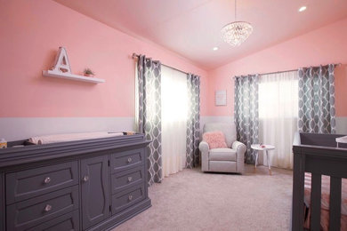 Nursery - shabby-chic style girl carpeted nursery idea in San Diego with pink walls