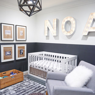 Nursery - small contemporary gender-neutral gray floor nursery idea in Orange County with gray walls
