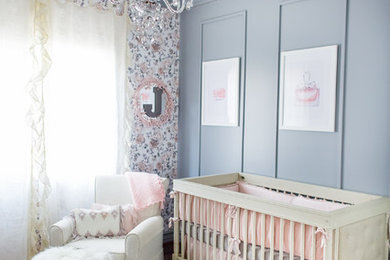 Inspiration for a large modern girl dark wood floor nursery remodel in Philadelphia with gray walls