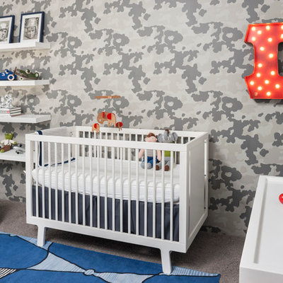 Inspiration for a contemporary gender-neutral carpeted and gray floor nursery remodel in Orange County with gray walls