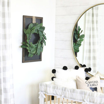 Large Brass Mirror Above the Crib