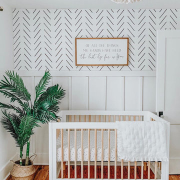 Mid-century modern baby boy nursery interior