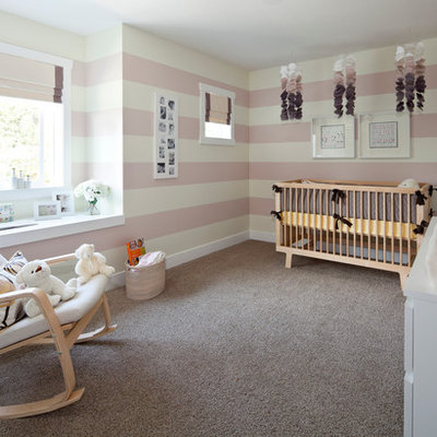 Nursery - mid-sized transitional girl carpeted and gray floor nursery idea in Vancouver with pink walls
