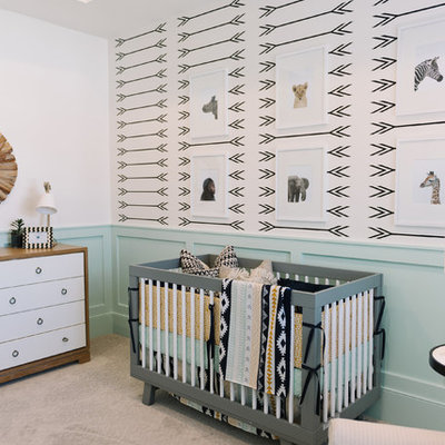 Example of a mid-sized danish gender-neutral carpeted and gray floor nursery design in Salt Lake City with green walls